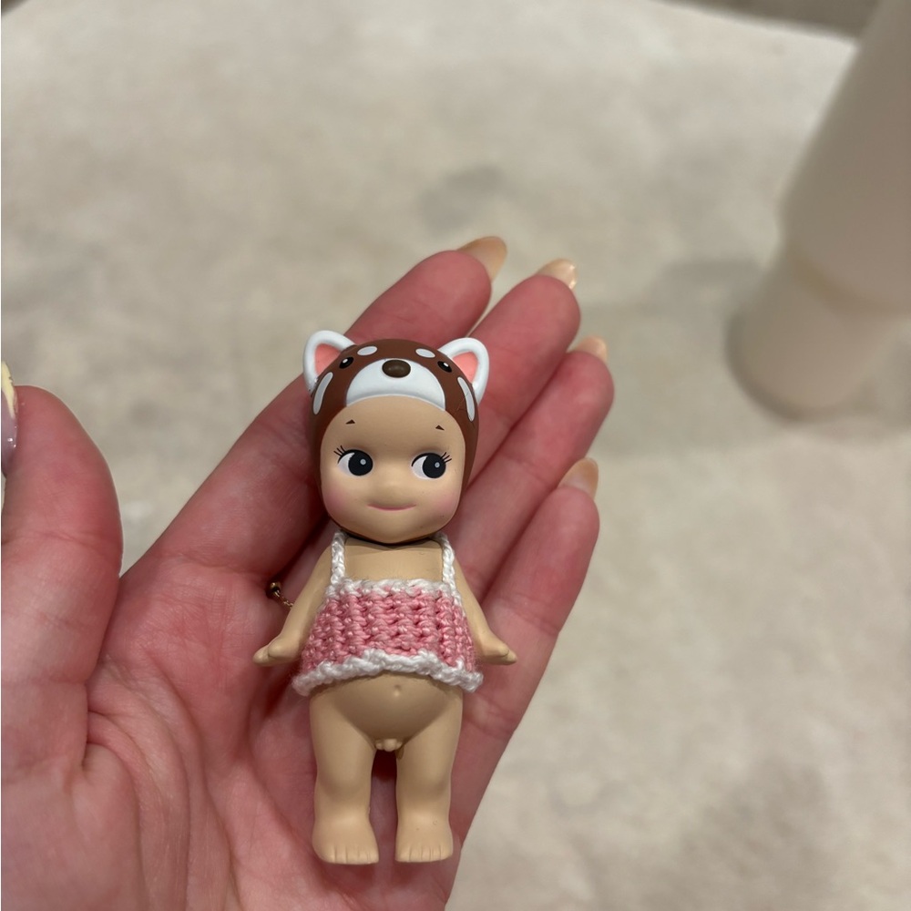 Sonny Angel red panda with cute pink dress